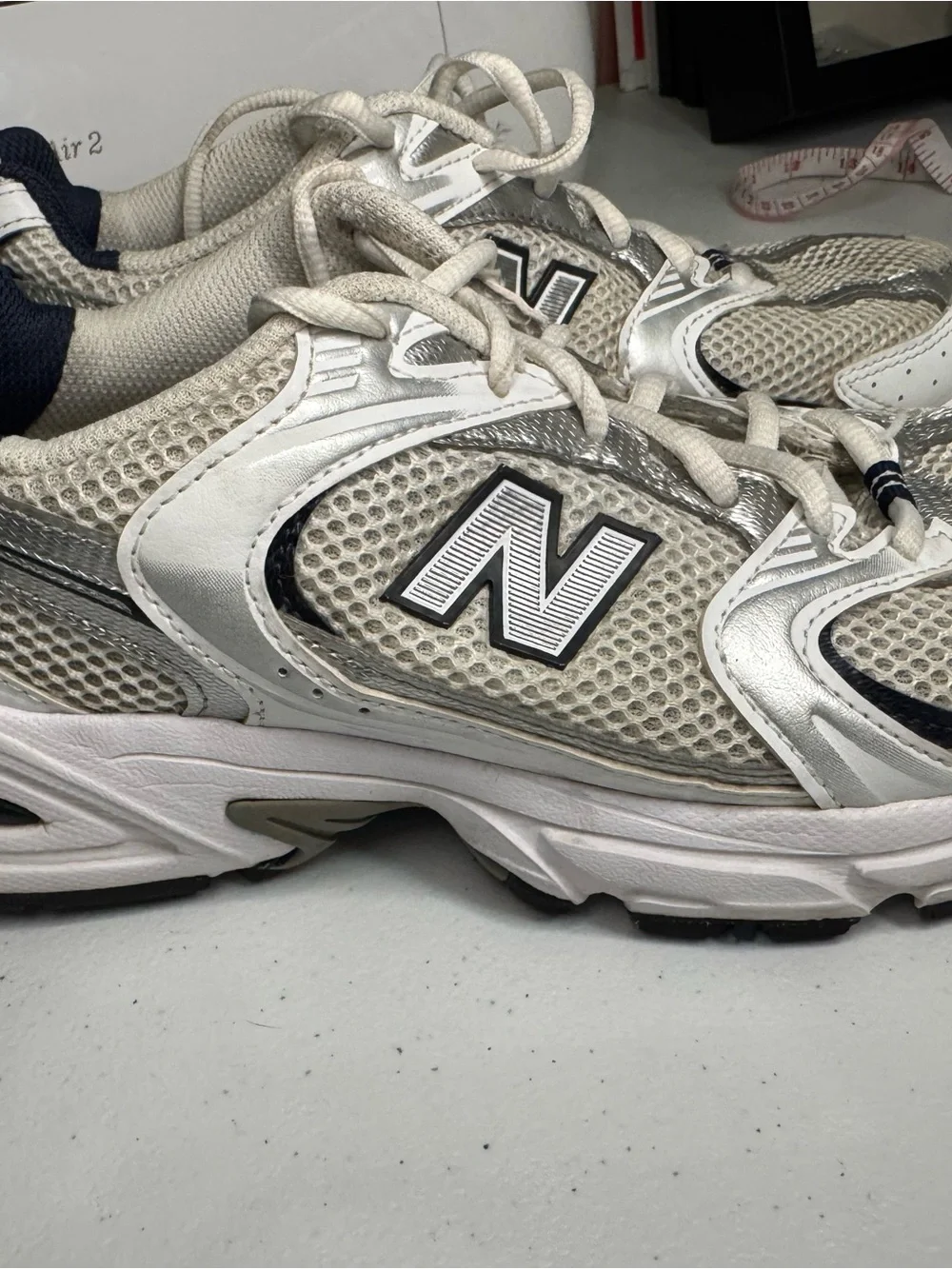 New Balance White and Silver Athletic Sneakers